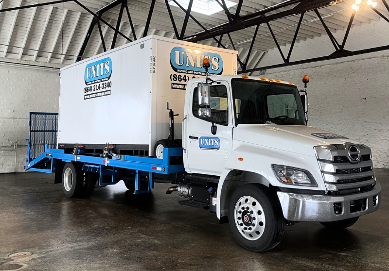 UNITS of Asheville portable storage facility with the truck and container inside.