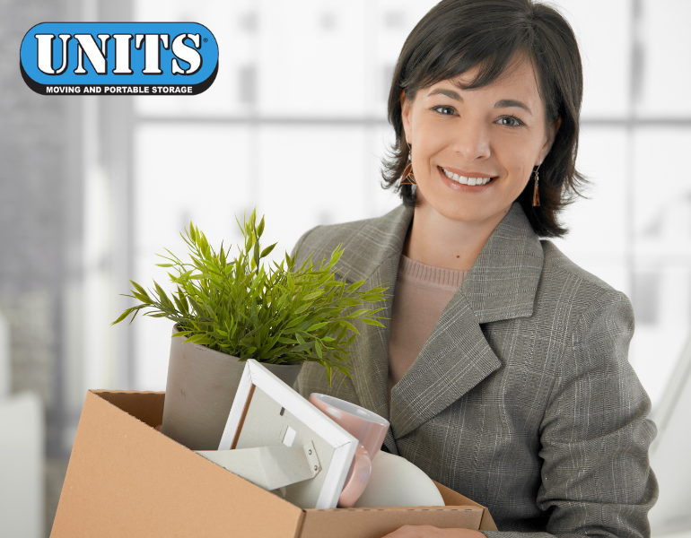 a working woman with a moving box and units logo