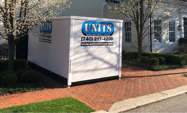 Units moving and portable storage container sitting in a driveway.
