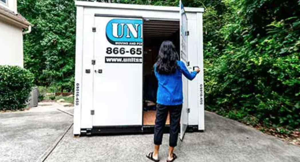 Woman checking her onsite UNITS Portable Storage Container in Baltimore Maryland.