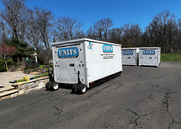 UNITS of Bucks Mercer County's portable storage containers parked on a driveway.