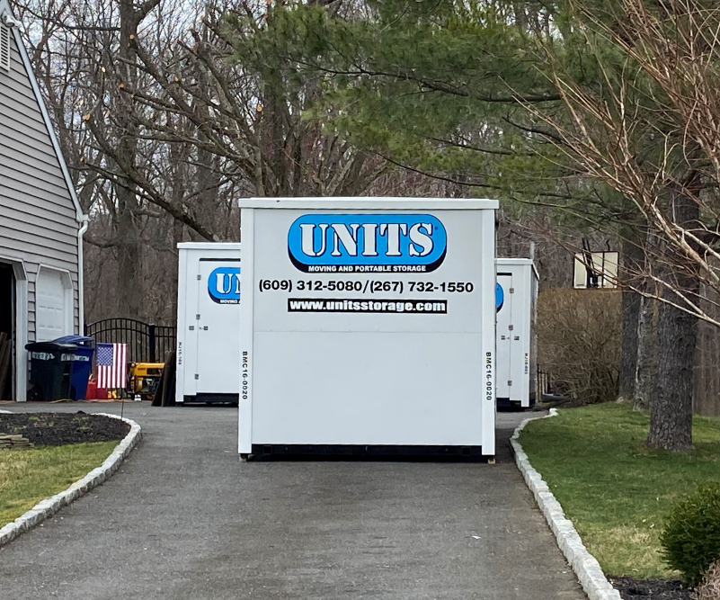 3 portable storage containers in NJ driveway