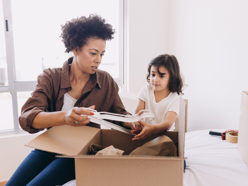 mother and daughter packing