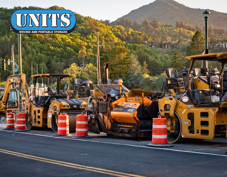 a pic of roadwork happening and units logo