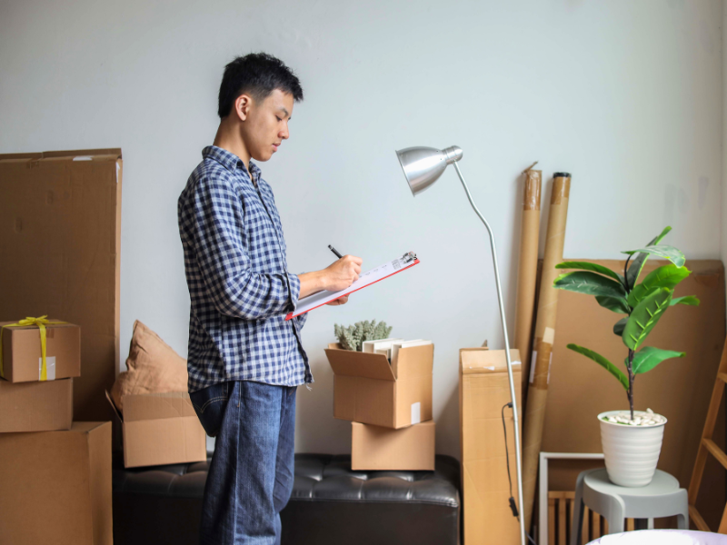 man going over his Fall Moving Checklist