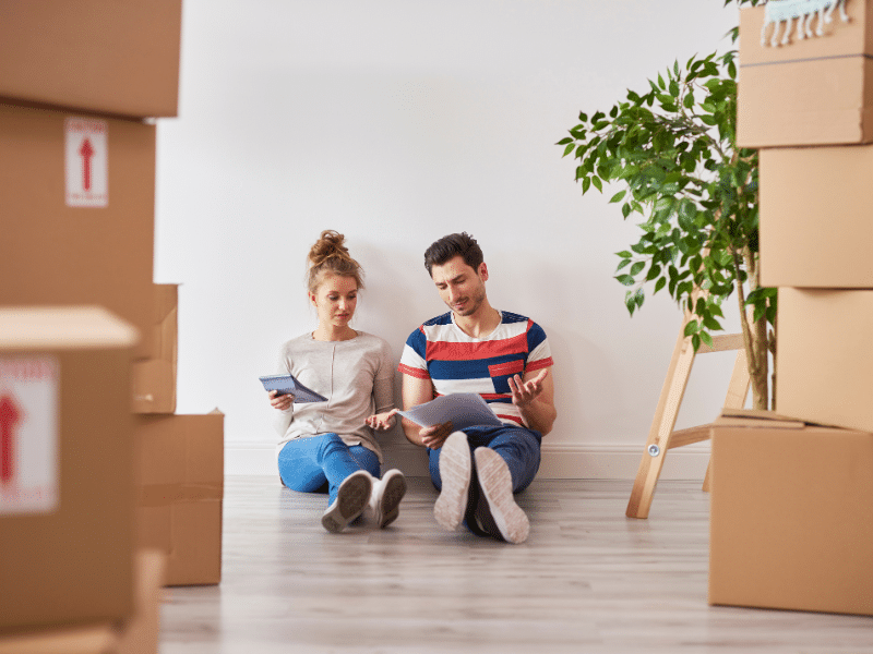 couple moving lookins at moving expenses