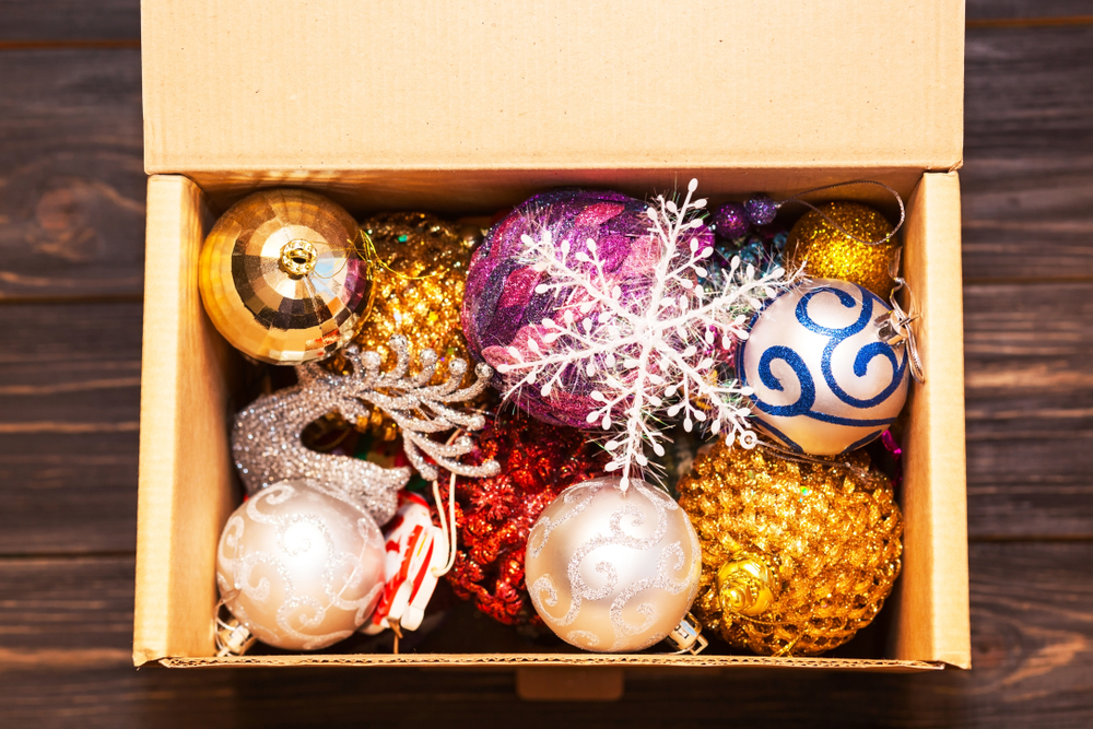 holiday decorations in a cardboard box.