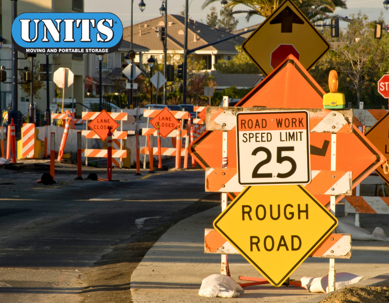 pic of roadway construction signs and units logo