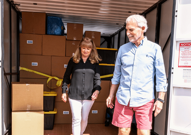 Elderly couple moving their stuff into their connecticut UNIT