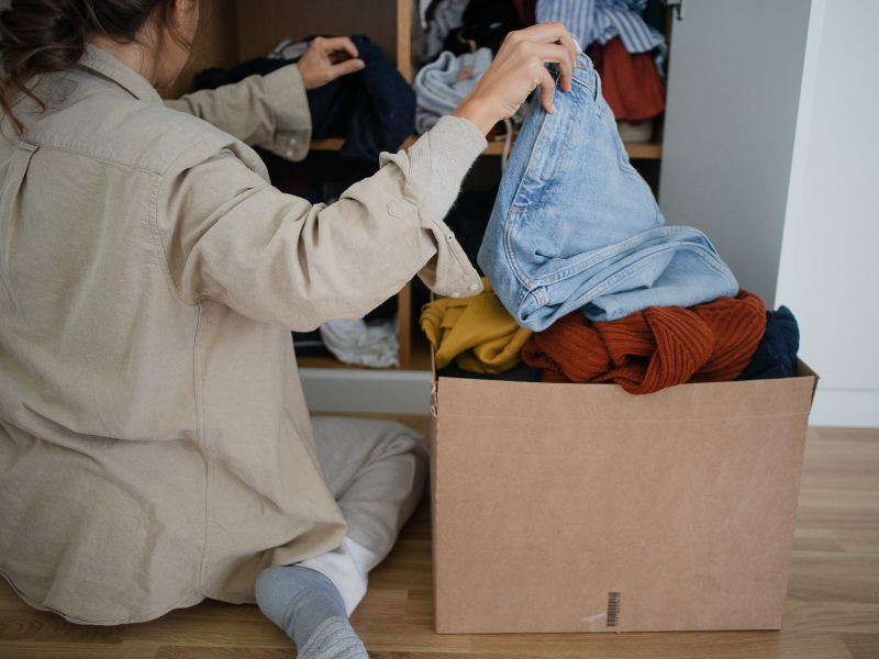 woman Decluttering before moving