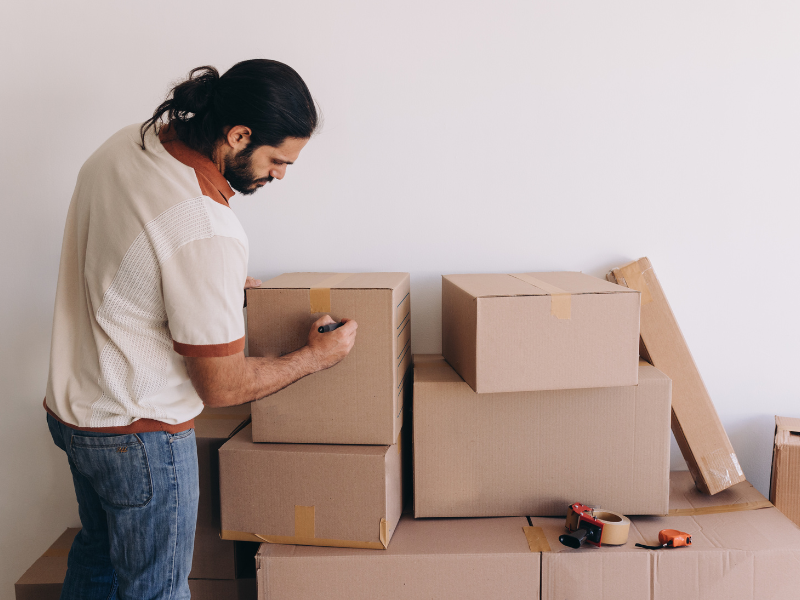 man in the middle of the packing process