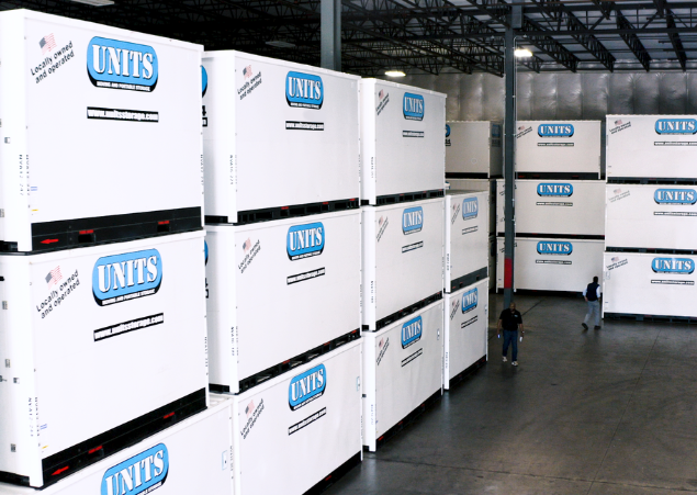 UNITS Moving and Portable Storage containers in a warehouse.