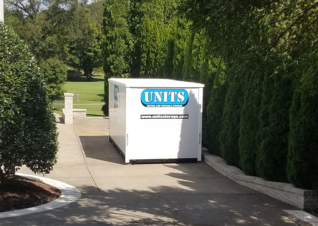 UNITS Moving and Portable Storage Container in a driveway.