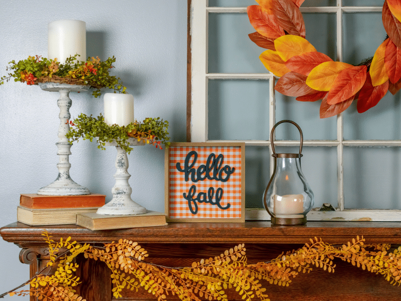 Fall decorations on a shelf.