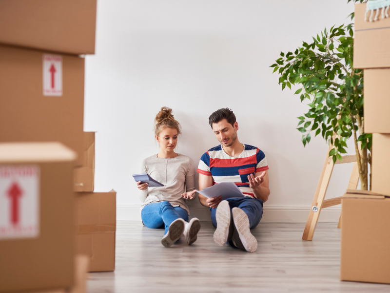 couple going over Budget-Friendly Moving Tips