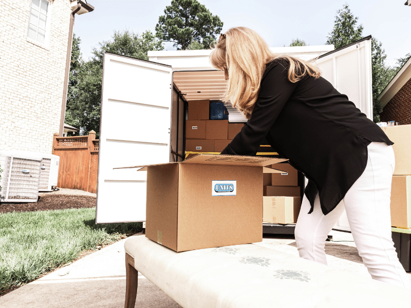woman packing her portable storage container