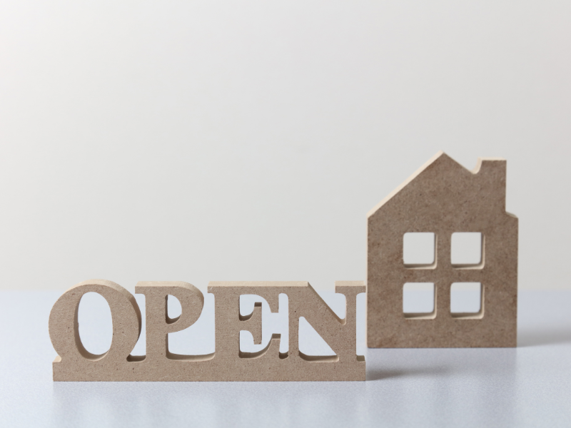 open house: the word open next to a house