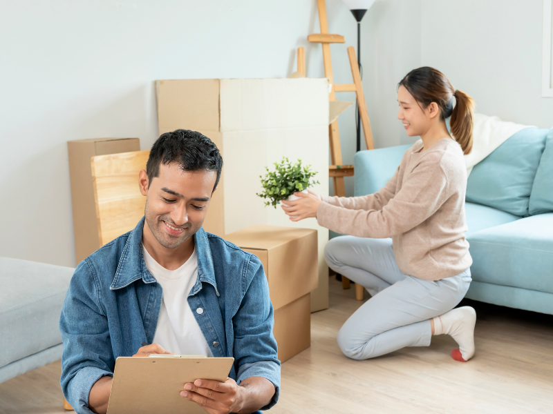 Man looking over his Moving Checklist