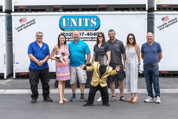 Portable Storage Units & Moving Services in Las Vegas, NV. Short guy with a mask dancing in front of UNITS.