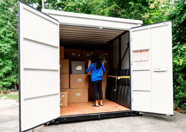 Woman packing up a UNITS Moving and Portable Storage container.