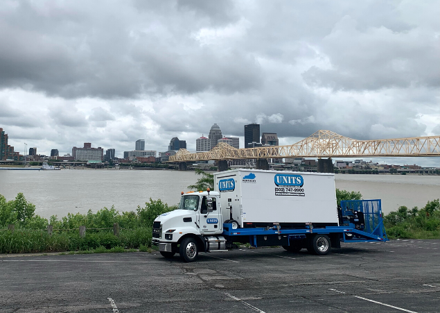 A Units Of Louisville truck parked in a parking lot.