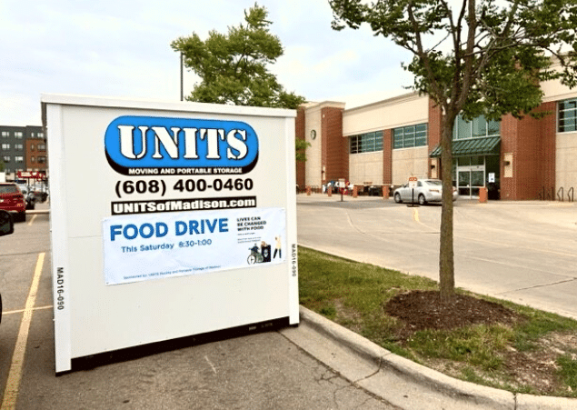 UNITS of Madison storage container parked ouside of a supermarket