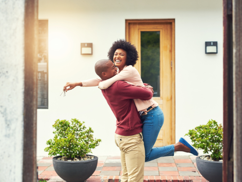 couple happy about Owning a House