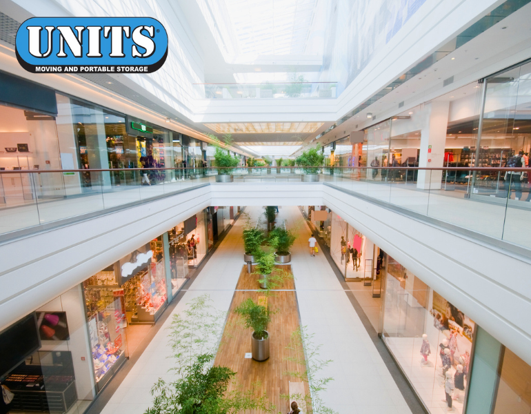 a pic of a mall and units logo
