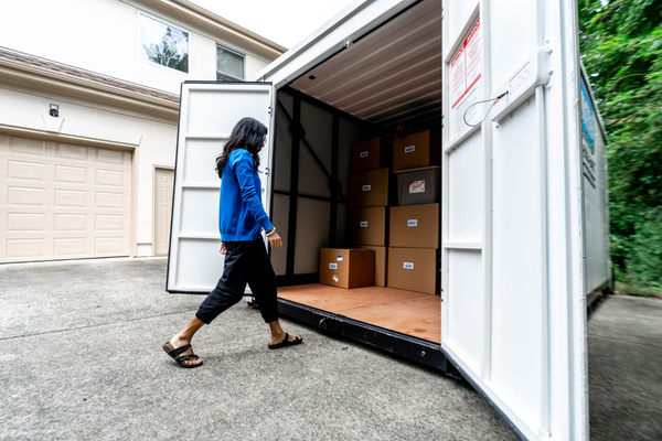UNITS Milwaukee woman walking into open storage container