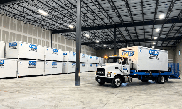 Units of Minneapolis truck sitting inside of storage warehouse