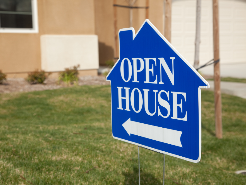 a sign for Open Houses