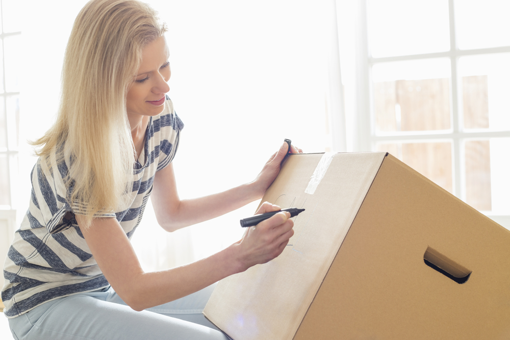 Units of North Houston woman labeling package for moving