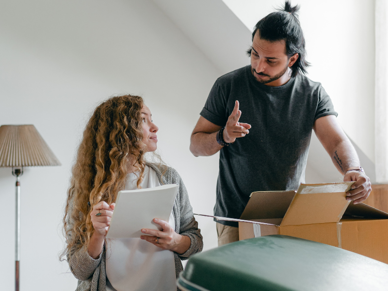 couple looking over Moving Checklist