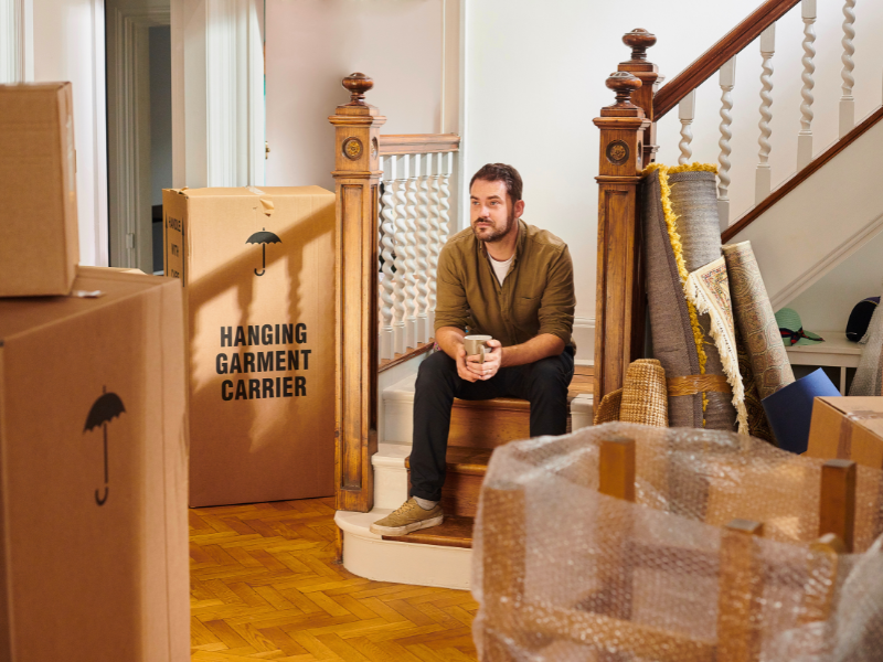 Man Coping With the Emotional Impact of Leaving a Home
