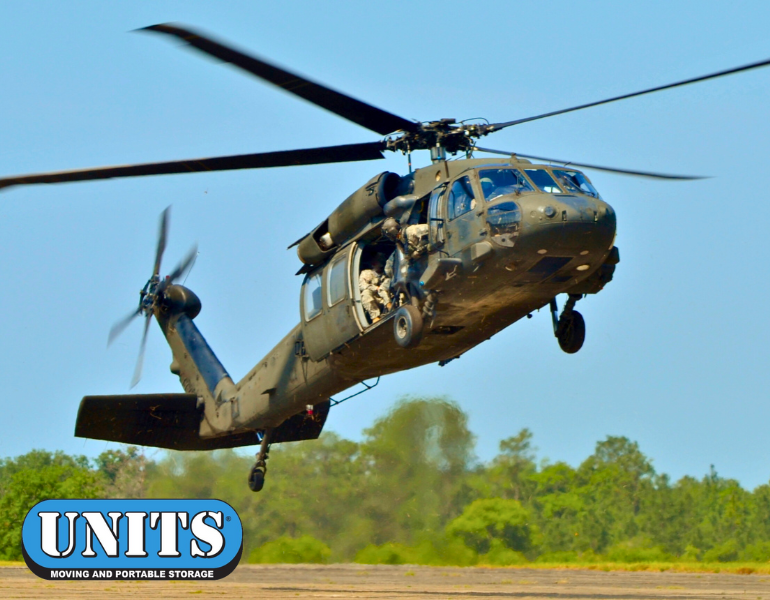a pic of a military helicopter and units logo
