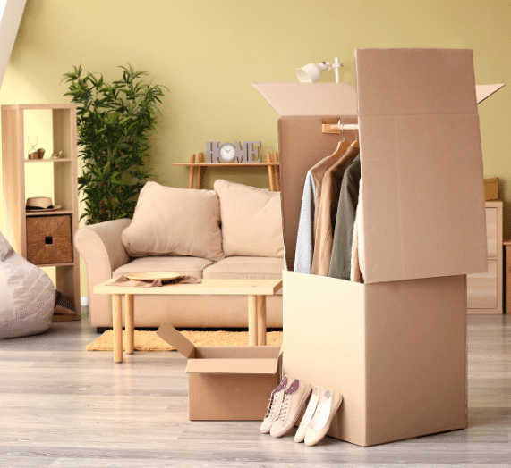 Boxes sitting in a living room ready to be unpacked.