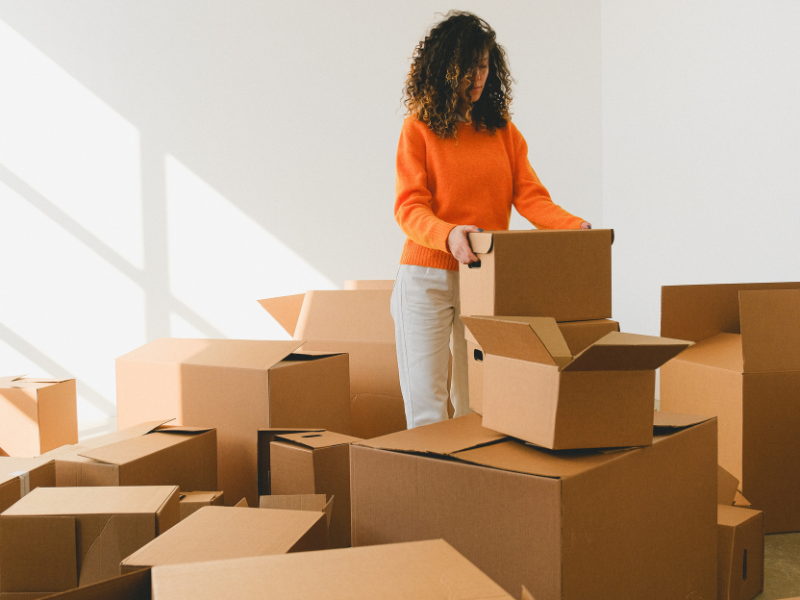 woman who is making some common moving mistakes