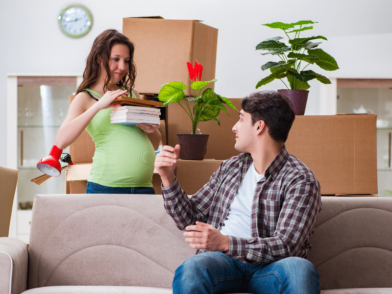 a women Moving During Pregnancy with her partner