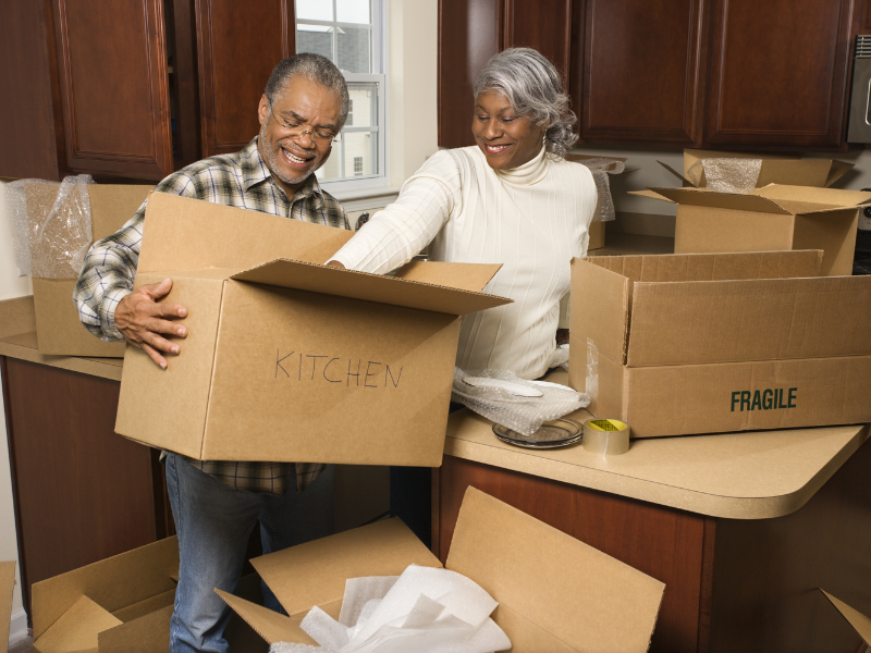 old couple Packing up their Kitchen