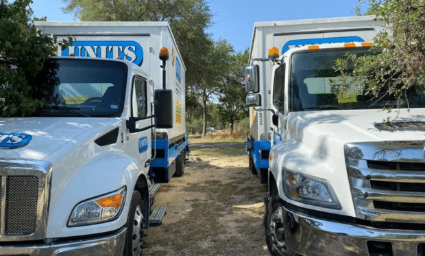 Two UNITS Portable Storage delivery trucks in San Antonio, Texas.