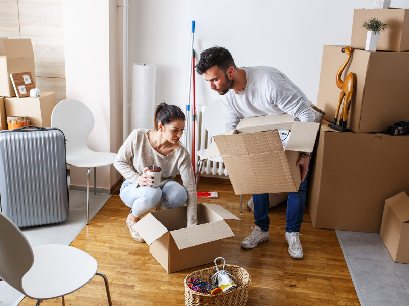 couple packing for their move