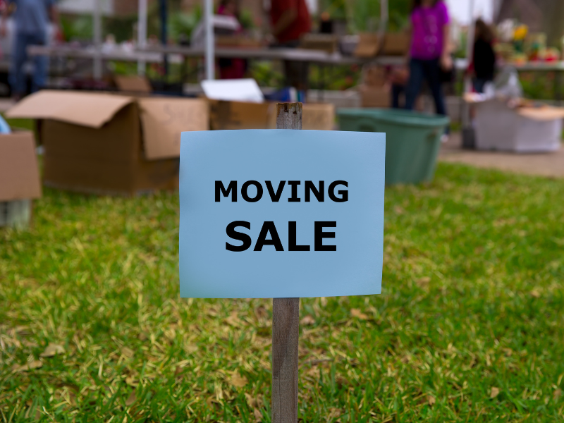 Moving Sale sign on lawn