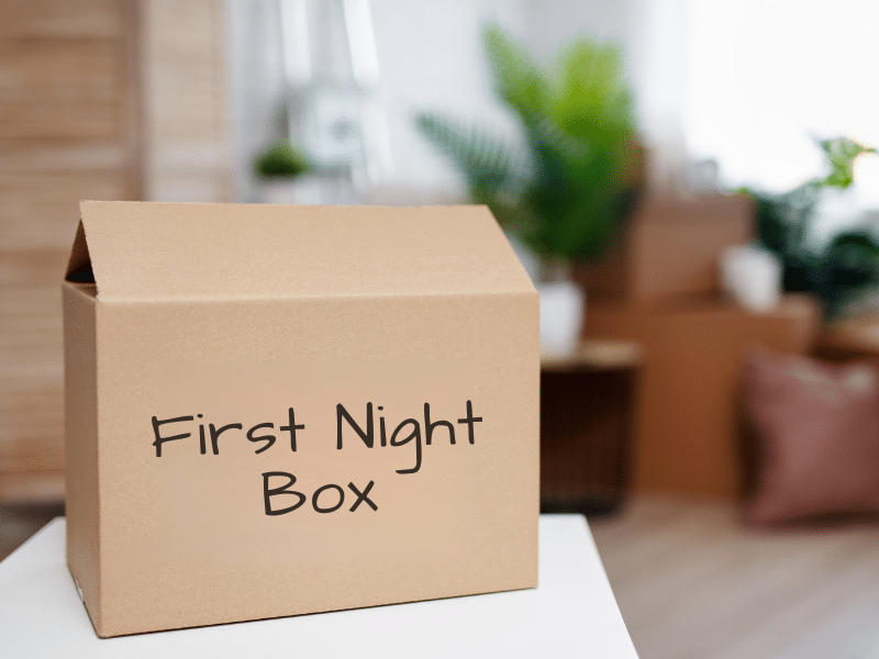 A box sitting on a table labeled First Night Box.