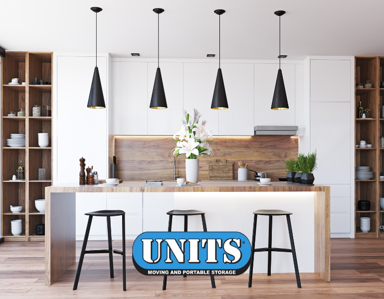 a staged kitchen with units logo