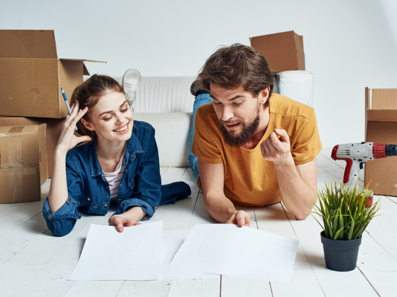 couple looking at moving checklist