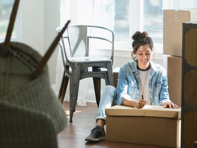 woman going through her moving checklist