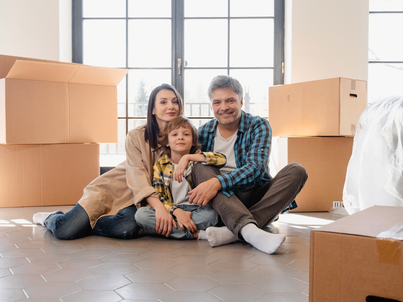 family in the middle of fall moving