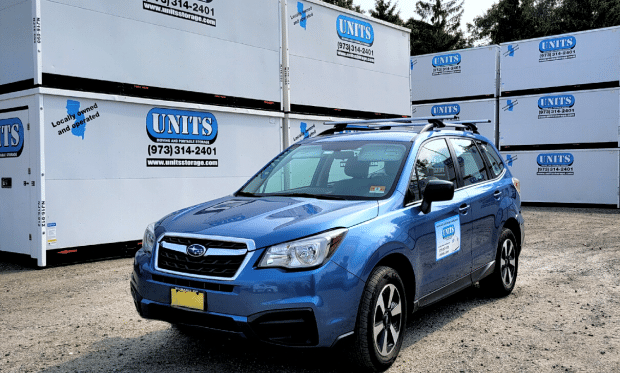 Subaru parked outside of a UNITS moving and portable storage facility