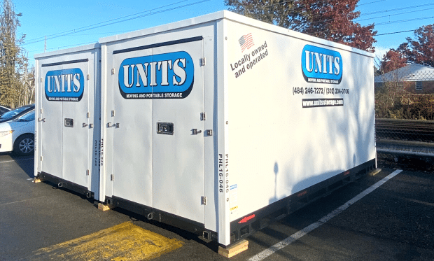 Two UNITS moving and portable storage containers side by side