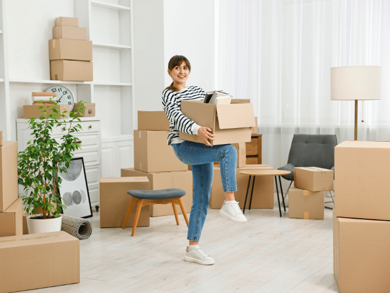 woman unpacking in her new home